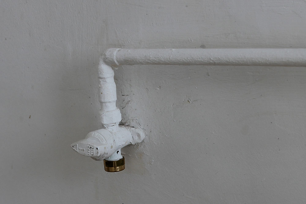 Image montrant une arrivée de gaz refermé par un bouchon correctement positionné.